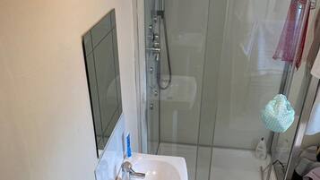 Combined shower/tub, deep soaking tub