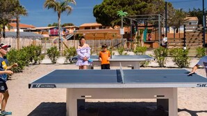 A beachside table tennis court with a visible brand name. - Mobile home with AC - 6 guests (Canet-en-Roussillon)