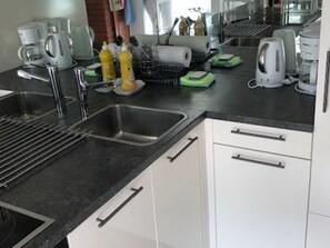Fridge, oven, dishwasher, cookware/dishes/utensils