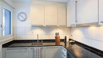 Fridge, oven, cookware/dishes/utensils