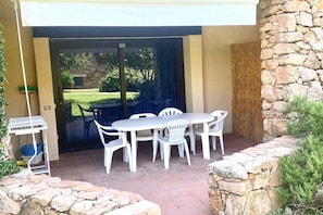 Outdoor dining - P.Rotondo1 B106 S, two-room apartment with 5 beds (Porto Rotondo)