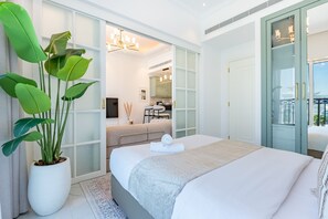 In-room safe, iron/ironing board, free WiFi, bed sheets - Refined 1BR Escape with Pool-Facing Views, Near to Dubai Butterfly Garden, (Dubai)