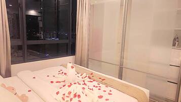 Luxury Condo, Non Smoking, City View | Desk, iron/ironing board, free WiFi