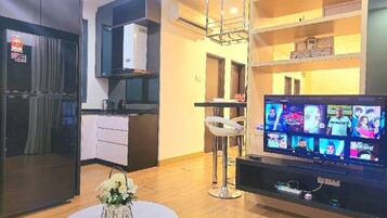 Condo de lujo, 1 cama Queen size, vista a la ciudad | Interior
