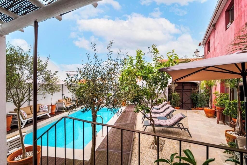 Seasonal outdoor pool, open 8:30 AM to 8:00 PM, pool loungers