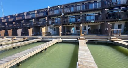 Waterfront Condo with Private Boat Slip and Community Swimming Pool