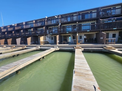 Waterfront Condo with Private Boat Slip and Community Swimming Pool