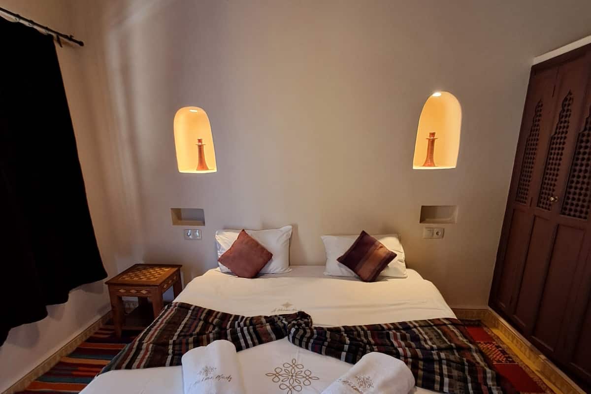 Premium bedding, pillow-top beds, in-room safe, blackout curtains