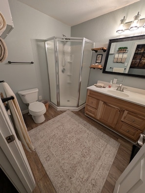 Shower, hair dryer, towels, soap