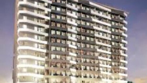 A multi-story hotel with balconies, a ground-level retail area, and a modern architectural design. - Family 2BR at MOA Sea Residence Sleeps 5 (Pasay City)