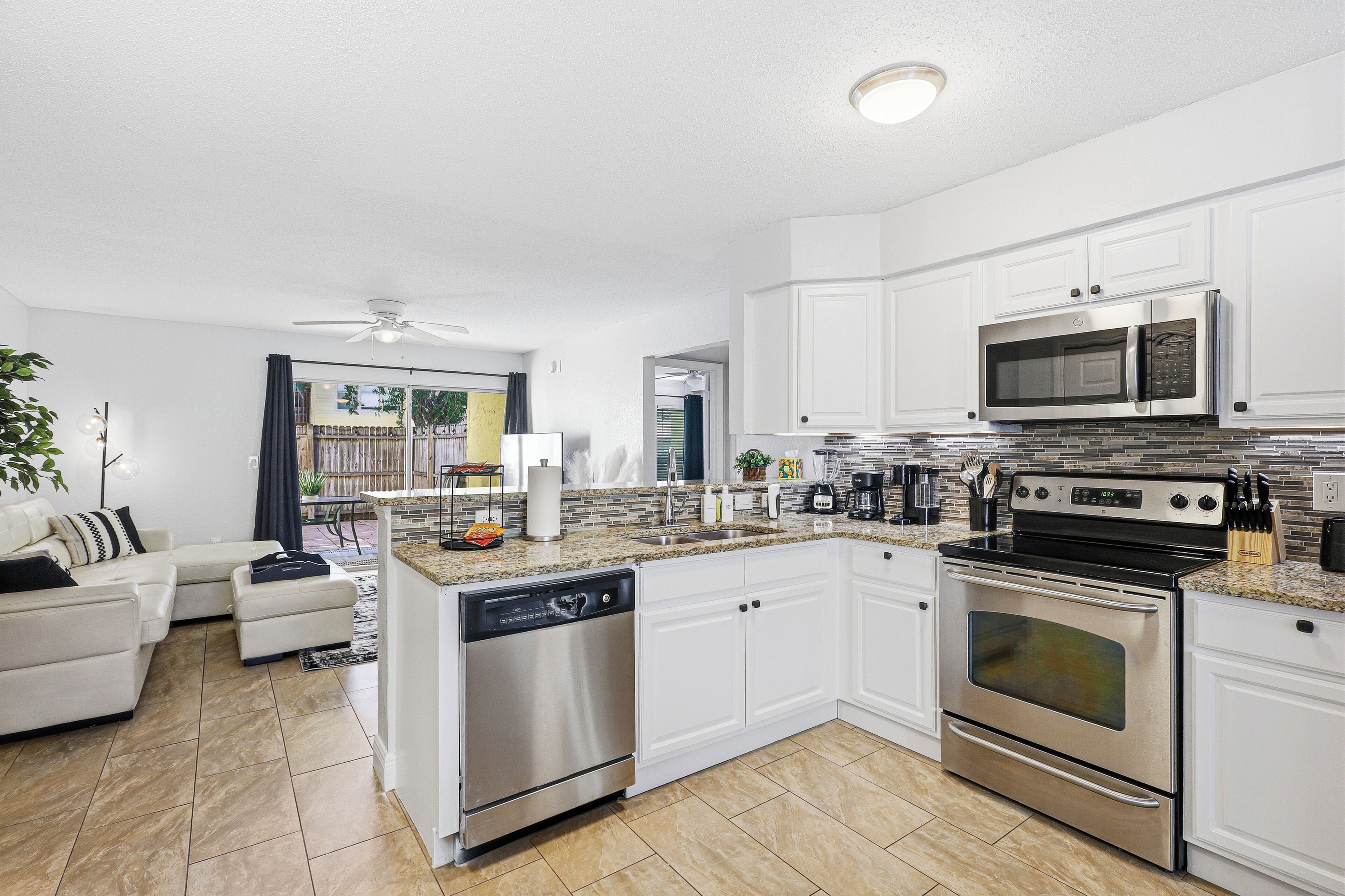 Coffee/tea maker, fridge, microwave, oven