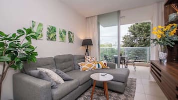 Appartement, balcon, vue ville | Coin séjour