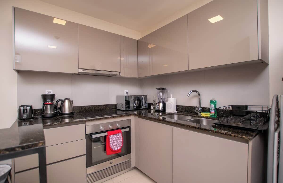 Apartamento, sacada, vista para a cidade | Cozinha privada