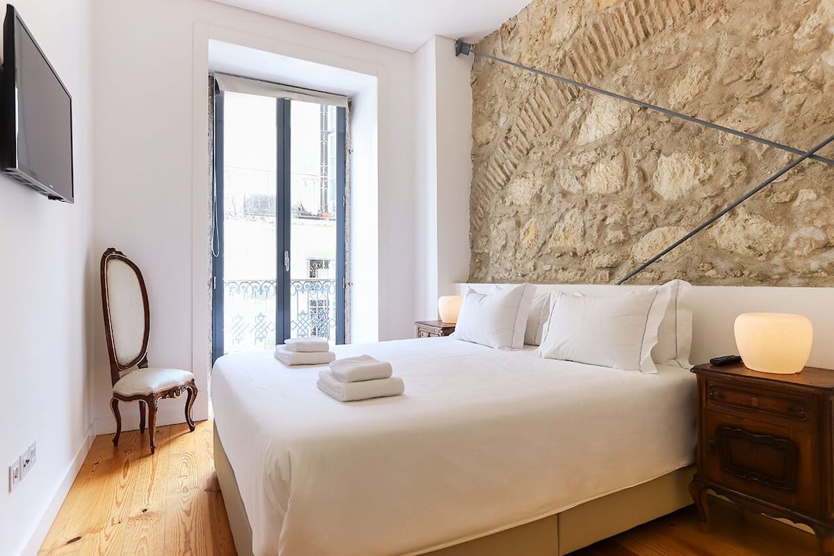 Apartament familiar | Espai de treball apte per a portàtils i cortines opaques 