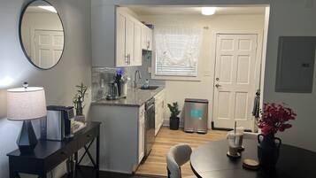 Coffee/tea maker, fridge, microwave, oven