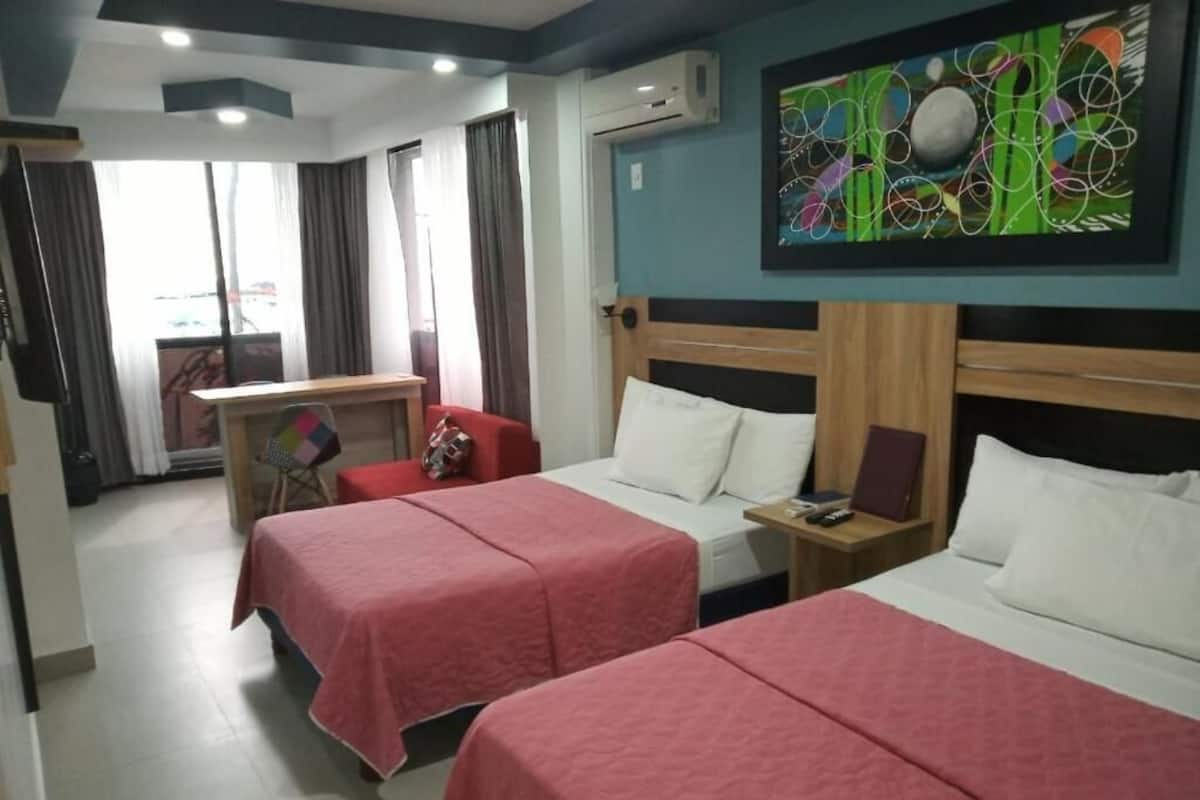 Deluxe Quadruple Room, Ocean View | Desk, laptop workspace, iron/ironing board (on request), WiFi (free)