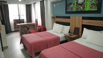 Deluxe Quadruple Room, Ocean View | Desk, laptop workspace, iron/ironing board, free WiFi