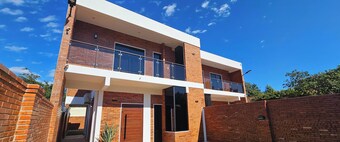 House near the airport, with large terraces and a barbecue
