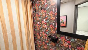 Shower, towels, soap, toilet paper