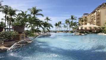 2 outdoor pools, pool umbrellas, pool loungers