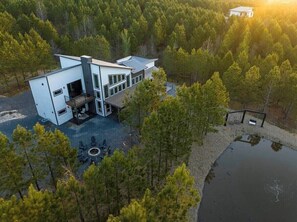 Exterior - NEW! Pondside Lux Cabin with Hot Tub, King Suites, Fire Pit & Game Loft (Broken Bow)