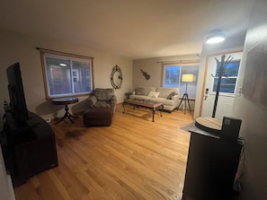 Living area - Paris theme cozy single family friendly home. 
Near MKE airport. Near hwy too! (Milwaukee)