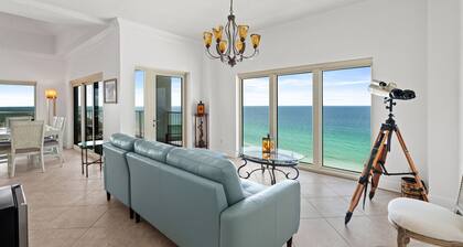 New! 3BR/3BA Beachfront condo with pool, hot tub, gym, and balcony views.