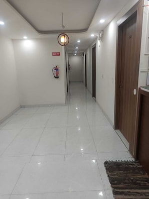Deluxe Double Room | Hallway - Radiant Hotel and Banquet  (Noida)
