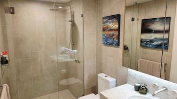 Shower, hair dryer, towels, soap