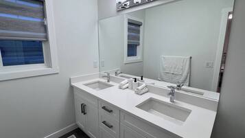 Hair dryer, towels, soap, shampoo