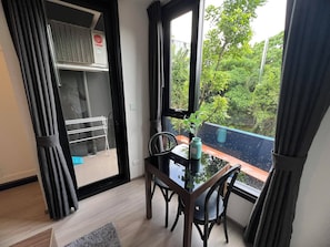 Comfort Studio, Kitchenette, Garden View | Dining - the base central phuket - YJB (Tambon Wichit)