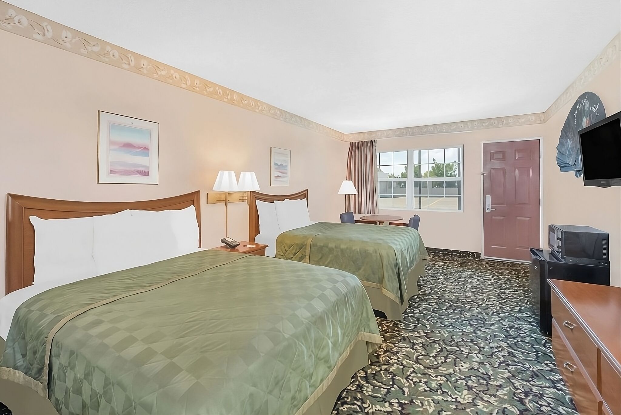 Stretch out comfortably with two beds and in-room TV.