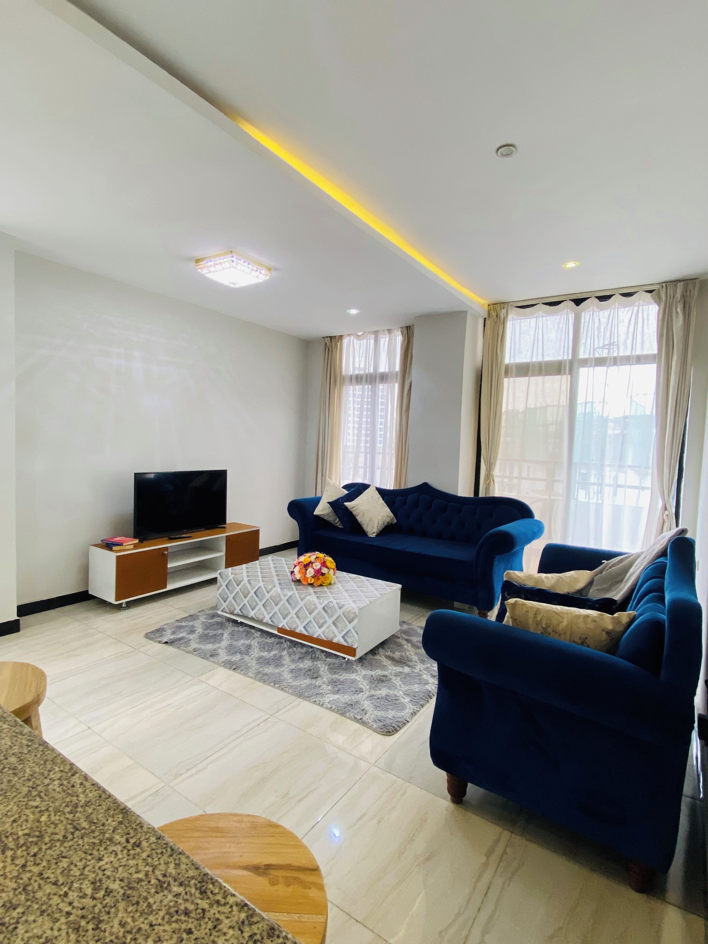 Căn hộ Deluxe, ban công, quang cảnh thành phố | Khu phòng khách