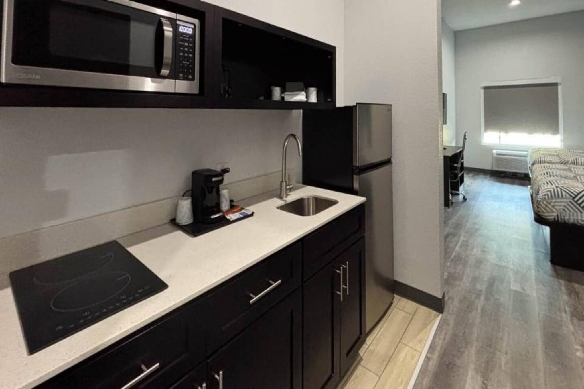 Fridge, microwave, stovetop, coffee/tea maker