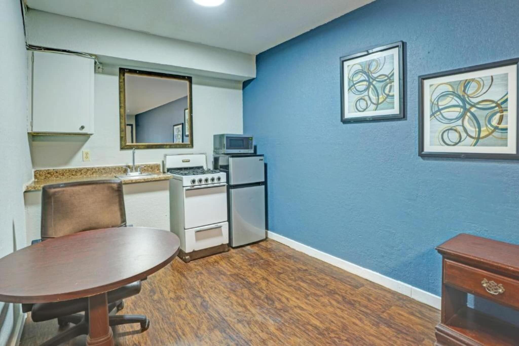 Fridge, microwave, dining tables