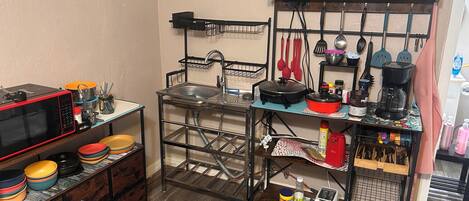 Fridge, microwave, coffee/tea maker, toaster