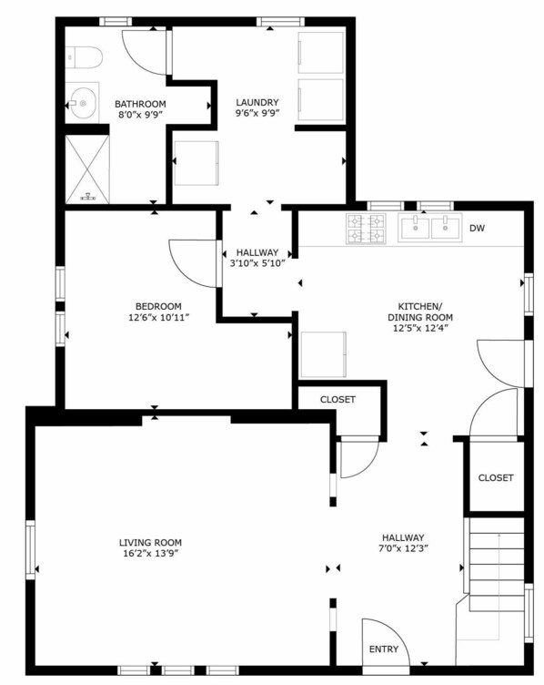 Un plan d’étage comprenant un salon, une chambre, une salle de bain, une cuisine et deux placards.