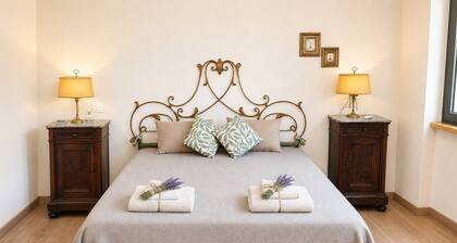 Three-room apartment nestled among olive and oak trees in northern Lazio, just a few minutes from Viterbo
