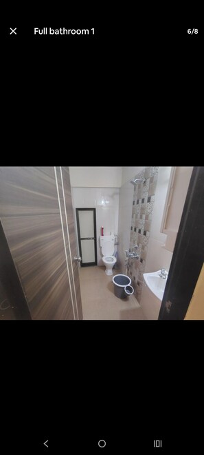 Bathroom - Bright balcony  2-bedroom apartment with AC in vibrant Thane/ Mulund (Thane)
