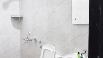 Shower, rainfall showerhead, slippers, towels