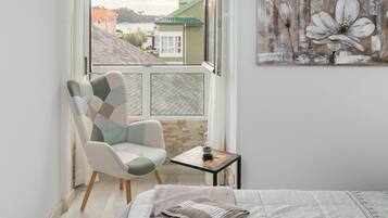 Iron/ironing board, travel crib, free WiFi, bed sheets