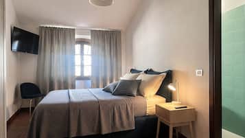 Wi-Fi de cortesia, roupa de cama
