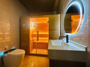 Shower, hair dryer, towels, soap