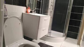 Shower, bidet, towels, soap