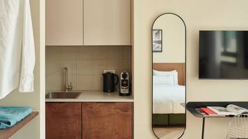 Espresso maker, mini-fridge, microwave, electric kettle