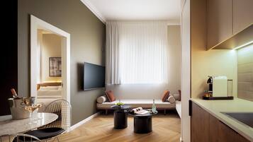 XXL Suite | Living area | 50-inch Smart TV with cable channels, Netflix, streaming services