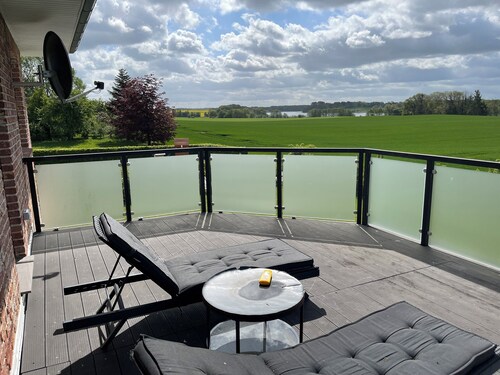 Beautiful upstairs vacation rental with a lake view