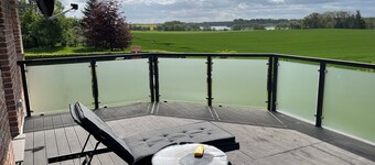 Beautiful upstairs vacation rental with a lake view