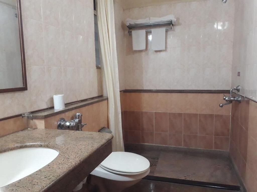 Basic Double or Twin Room | Bathroom | Shower, towels, soap, shampoo