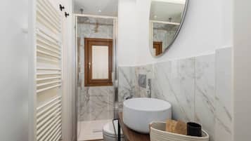 Shower, free toiletries, hair dryer, slippers